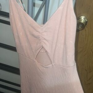 Pink dress with white specks and a cutout detail #pinkdress